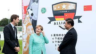 DFB und DFL: Austausch mit Merkel und Xi in Berlin
